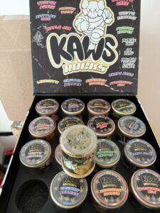 Discover KAWS MOONROCKS – Exotic Edition, a premium line of ultra-potent moonrocks crafted from high-quality cannabis flower, hash oil, and kief. Explore exotic strains like Zkittlez Cake, Frozen Grapes, Gelato Cake, and Grape Sorbet — designed for intense flavor, smooth smoke, and unmatched potency.
